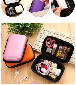Internal mesh pocket and elastic strap of the hard shell portable cable organizer