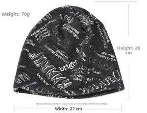 Detail view of a knitted beanie with silver lettering, 26cm height and 27cm width