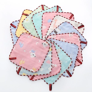 Stack of 6-layer cotton baby gauze towels with cute cartoon animal prints and red edges