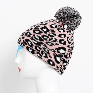 Pink and black leopard print knit beanie with fluffy faux fur pompom for women