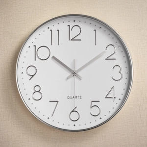 Minimalist 14-inch silent wall clock with silver 3D numbers and white quartz dial