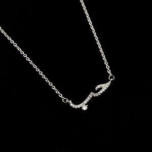 Detailed view of silver Arabic Love calligraphy pendant necklace with sparkling zircons
