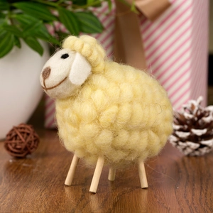 Minimalist wool felt sheep ornament with curly texture and wooden legs for home decor