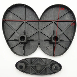 Close-up of black plastic Christmas doll telescopic rod base parts with size markings