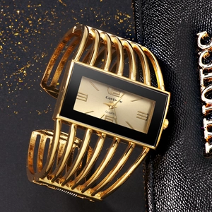 Macro view of CANSNOW champagne gold rectangular dial and hollow cuff bracelet watch