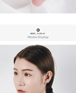 Model wearing minimalist blue pentagram earrings with cubic zirconia inlay on the ear