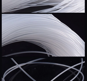 Macro detail of high-strength translucent white nylon monofilament fishing line strands