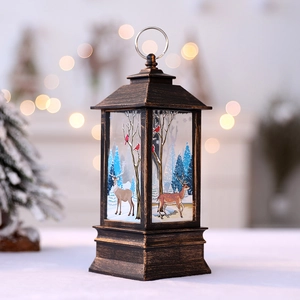Vintage bronze Christmas lantern with reindeer print and LED flame for festive decor