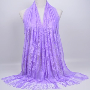 Elegant purple lace shawl with decorative long fringes for women, displayed on a mannequin