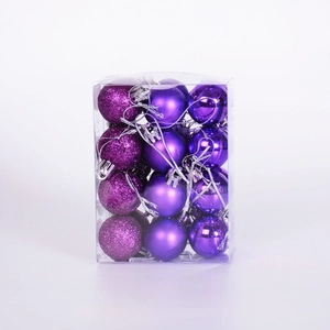 Detailed view of purple Christmas ball ornaments set in square box with assorted textures