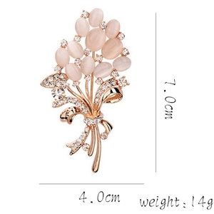 Elegant floral flower brooch with pink opals and zircons in gold-plated finish