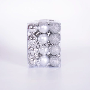 Detail of 24 silver Christmas ornaments in matte glitter and glossy finishes in a box