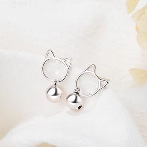 Minimalist silver tassel earrings featuring hollow cat head design and a small round bell