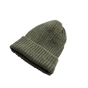 Women's warm olive green rib-knit beanie hat in a minimalist solid color winter style
