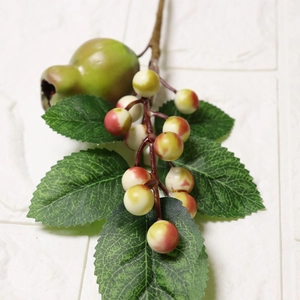 Artificial Christmas berry branch with green pomegranate fruit and red yellow berries