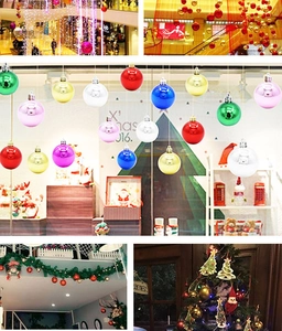 Detail of colorful shiny Christmas ornaments hanging in a festive mall and home display