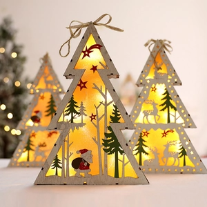 Lighted wooden Christmas tree ornament featuring Santa Claus and deer patterns