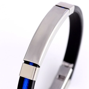 Adjustable black silicone and silver stainless steel bracelet with blue inner texture detail