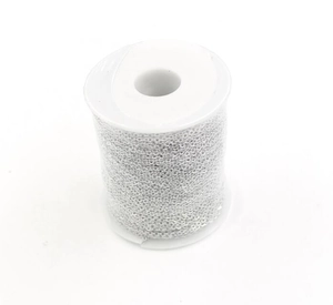 Macro shot of 1.5mm silver metal cross chain neatly wound on a white plastic spool
