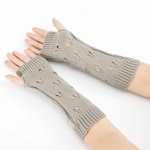 Detailed knit texture and heart cutout design on gray long fingerless arm warmers