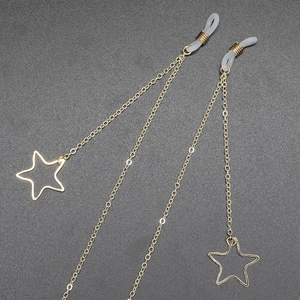 Rutschfeste goldene Brillenkette aus Metall mit Sternanhängern und Silikonschlaufen
