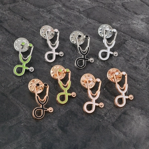 Set of eight retro stethoscope pins in gold and silver finish with colorful enamel