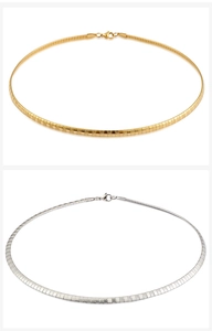 Detail of 4mm gold and silver choker necklaces featuring textured geometric patterns
