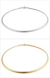 Detail view of 4mm titanium steel snake chains in silver and gold with lobster clasp