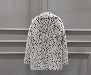 Detailed back view of a faux fur leopard print coat featuring soft white and black spots
