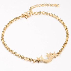 Elegant gold bracelet with star and moon charms and adjustable chain on white background