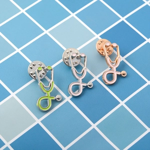 Three-piece stethoscope enamel pins set in green, pink and rose gold alloy for doctors