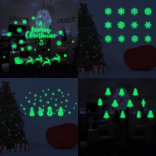 Luminous Christmas decals featuring snowflakes and reindeer glowing in dark interiors