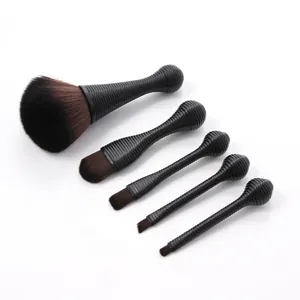 5-piece professional makeup brush set with black matte handles and gradient soft bristles