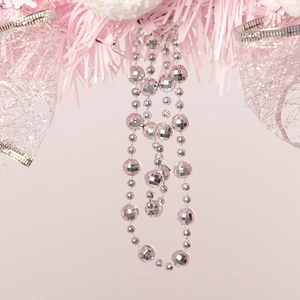 Pink Christmas wreath with silver faceted bead chain for creative holiday home decoration