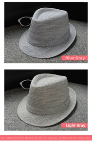 Detail of wool jazz fedora hats in cyan and light grey with refined woven texture
