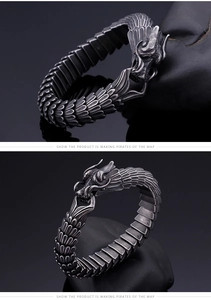 Macro detail of retro stainless steel dragon scale bracelet with punk dragon head clasp
