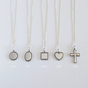 Minimalist S925 sterling silver necklaces featuring circle, oval, heart and cross pendants