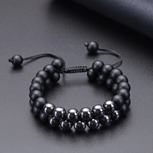 Detail of double-layer natural stone beaded bracelet with matte black and hematite beads