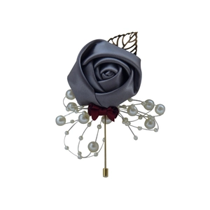 Elegant grey satin rose boutonniere with burgundy ribbon, gold leaf, and pearl details