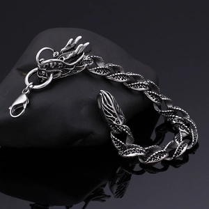 Vintage silver dragon head bracelet in stainless steel with detailed dragon scale texture