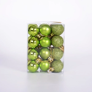 Detailed view of fruit green Christmas ornaments in gloss, matte, and glitter finishes
