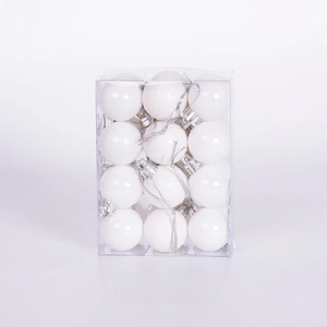 Detailed view of 24 white Christmas balls in gloss and glitter finishes inside a square box