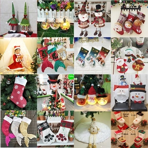 Collection of festive Christmas stockings and holiday dining chair covers set