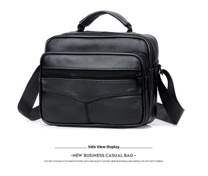 Side view of black genuine leather business bag featuring litchi grain and canvas strap