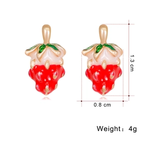 Detail shot of strawberry earrings with dimensions 1.3cm x 0.8cm and 4g weight specs