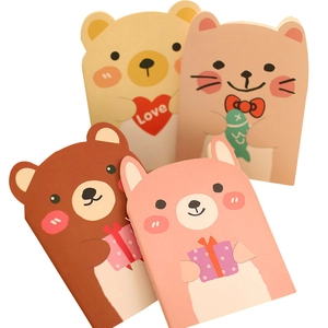Set of 4 cute cartoon animal pocket notebooks with bear and cat designs on white background