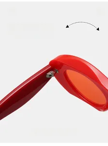 Detailed macro view of durable metal hinges on glossy red rectangular sunglasses