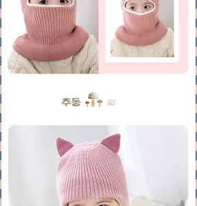 Pink knit balaclava for children featuring cute cat ears and full thermal neck protection