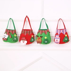 Detailed view of four felt Christmas gift bags with 3D Santa, Reindeer, and Snowman designs