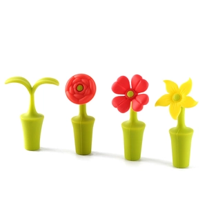 Set of four flower and sprout shaped silicone wine bottle stoppers in bright colors